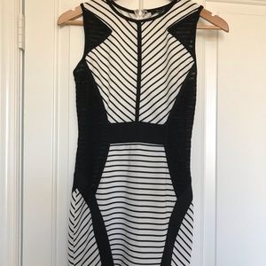 White and black dress, with sheer in lay on sides